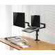 UVI black laptop and tablet tray attached to a VESA monitor arm, shown holding a laptop with adjustable depth and height settings