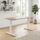 UVI STANDARD V2 Sit-Stand Desk Chalet Oak White UVI STANDARD V2 electric sit-stand desk with KAINDL Chalet Oak tabletop and white metal frame, front view