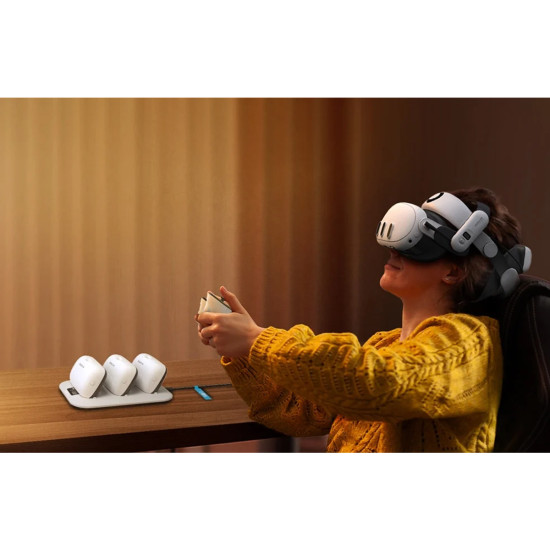 BOBOVR BD3 charging station with three B100 batteries docked, digital display showing charge levels and power output
