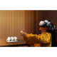 BOBOVR BD3 charging station with three B100 batteries docked, digital display showing charge levels and power output