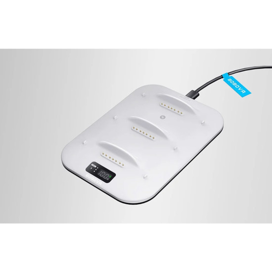 BOBOVR BD3 charging station with three B100 batteries docked, digital display showing charge levels and power output