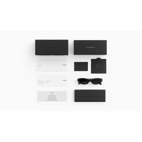 Meta Starfire Kylie Edition smart glasses in Classic Black with slim oval frames, XS 48-21 fit, front view showing ultrawide camera lens