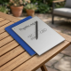 reMarkable Paper Pro Book Folio – Cobalt Blue reMarkable Paper Pro Book Folio case in cobalt blue mosaic weave fabric, closed with magnetic strap, front view