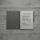 reMarkable Paper Pro + Marker Plus + Book Folio Gray reMarkable Paper Pro tablet in Polymer Weave Gray with Marker Plus stylus and Book Folio cover, open and viewed from above on a desk