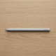 reMarkable 2 Marker stylus in white with slim matte finish, shown next to the reMarkable 2 tablet on a white background