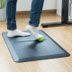 UVI Anti-Fatigue Standing Desk Mat UVI Anti-Fatigue Mat with massage ball on a hard floor in a standing desk workplace setting